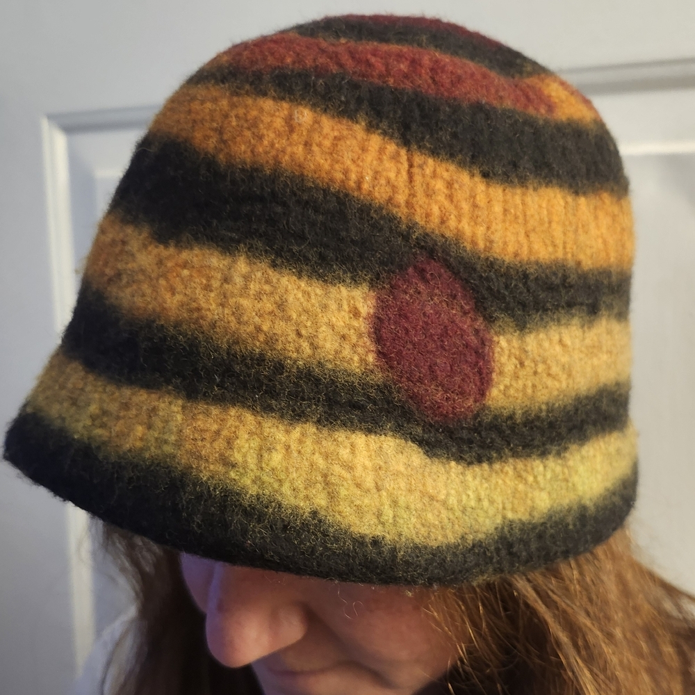 Unique Wool hand-felted hat with a black and yellow pattern nature